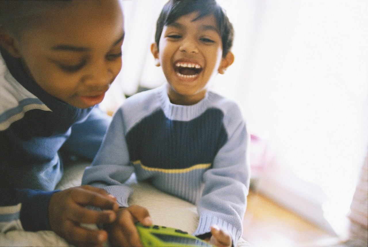 2 Boys aged 7 with gamestation