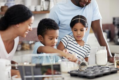 parents and child baking together
